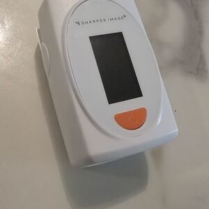 Sharper Image White and Orange Device
